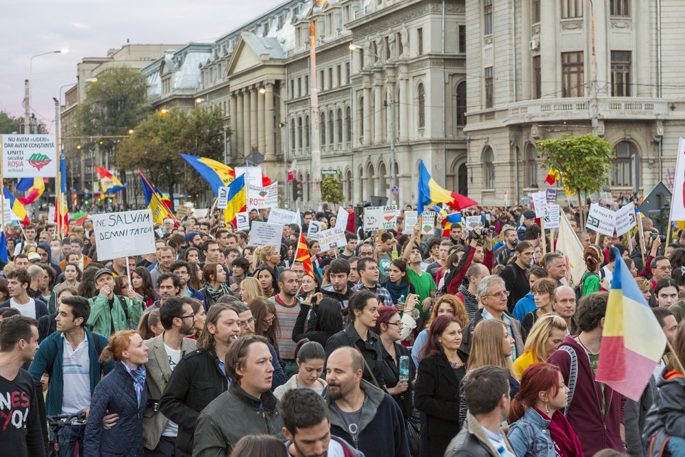 eople join the protests for the 22nd day against the plan to open Europe's largest open-cast goldmine in the Rosia Montana on Sept 22, 2013 in Bucharest, Romania. 