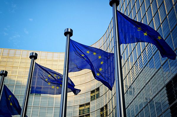 EU flags in front of European Commission in Brussels 