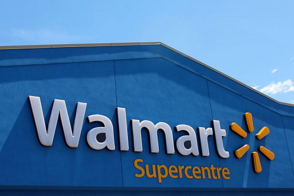 Walmart Supercentre sign on July 24, 2013 in Etobicoke, Ontario, Canada. Walmart is the world's third largest public corporation that runs chains of department stores. 