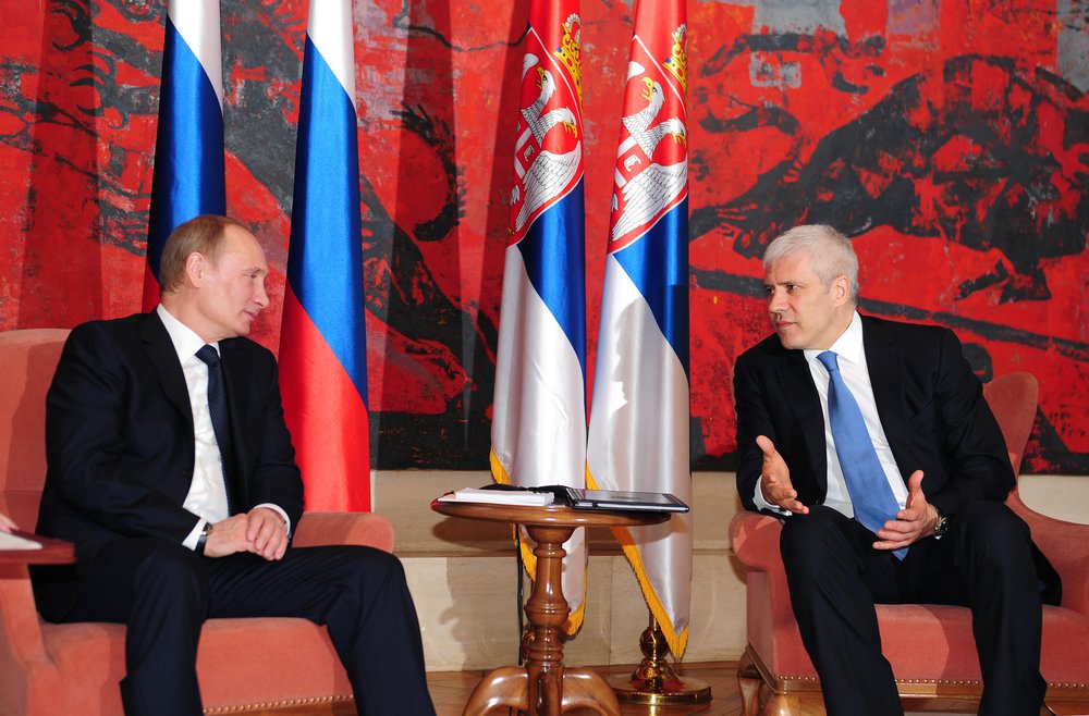 Serbia's President B.Tadic (R) talks with Russia's Prime Minister V.Putin about details of planning South Stream gas pipeline in Belgrade, Serbia, March 23, 2011