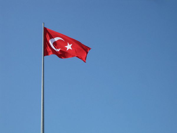 Flag of Turkey against blue sky