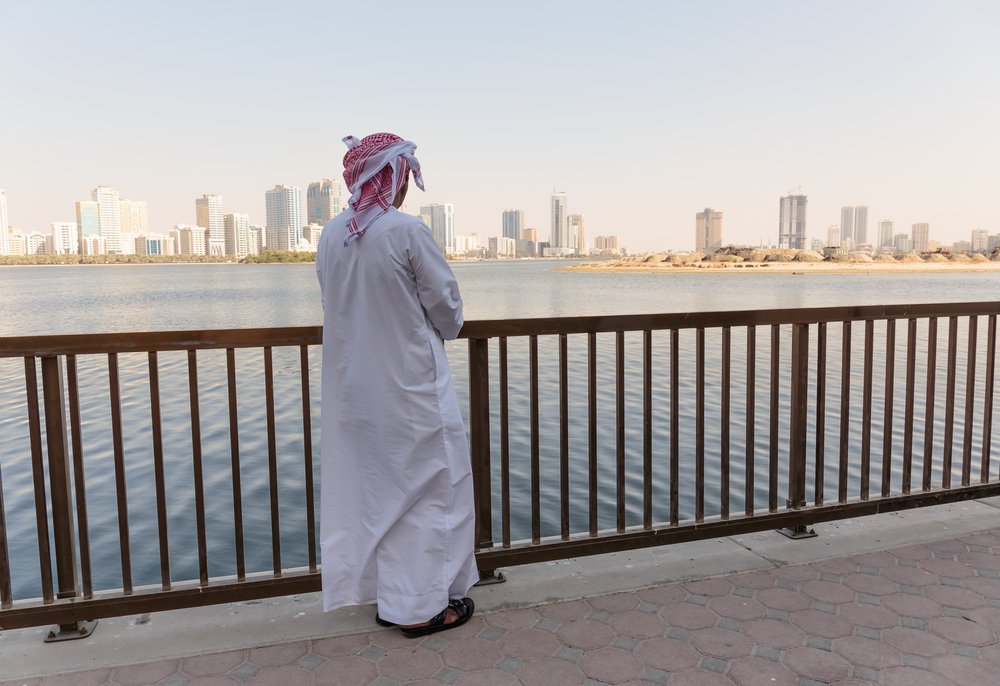 Arab men on the waterfront.